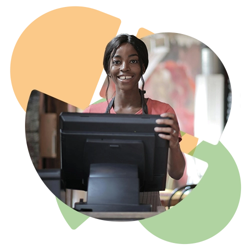 stylized photo of a smiling woman working at a cash register at a fast food restaurant